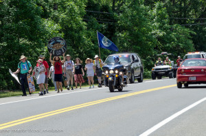 The six-mile march had a police escort./ Photo by Anne Meador