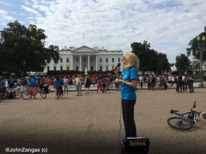 Valerie Plame Wilson speaks in front of the White House.