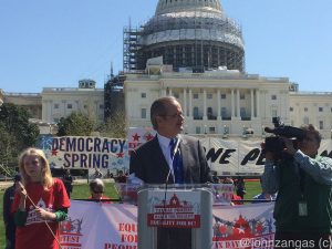 Dr. Lawrence Lessig speaks in front of the Capitol./Photo by John Zangas