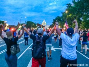Thousands marched on the Capitol after graphic video showed police, separately, shooting two black men./ Photo by John Zangas