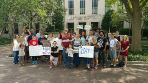 About 50 people gathered outside the U.S. District Courthouse in Washington, DC on Sept. 9 when the court was about to release a crucial ruling./Photo by Alex Lotorto